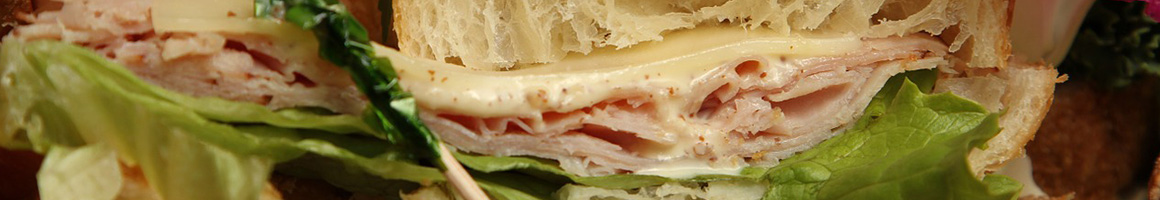 Eating Sandwich at Kipos Roast Beef restaurant in Wakefield, MA.